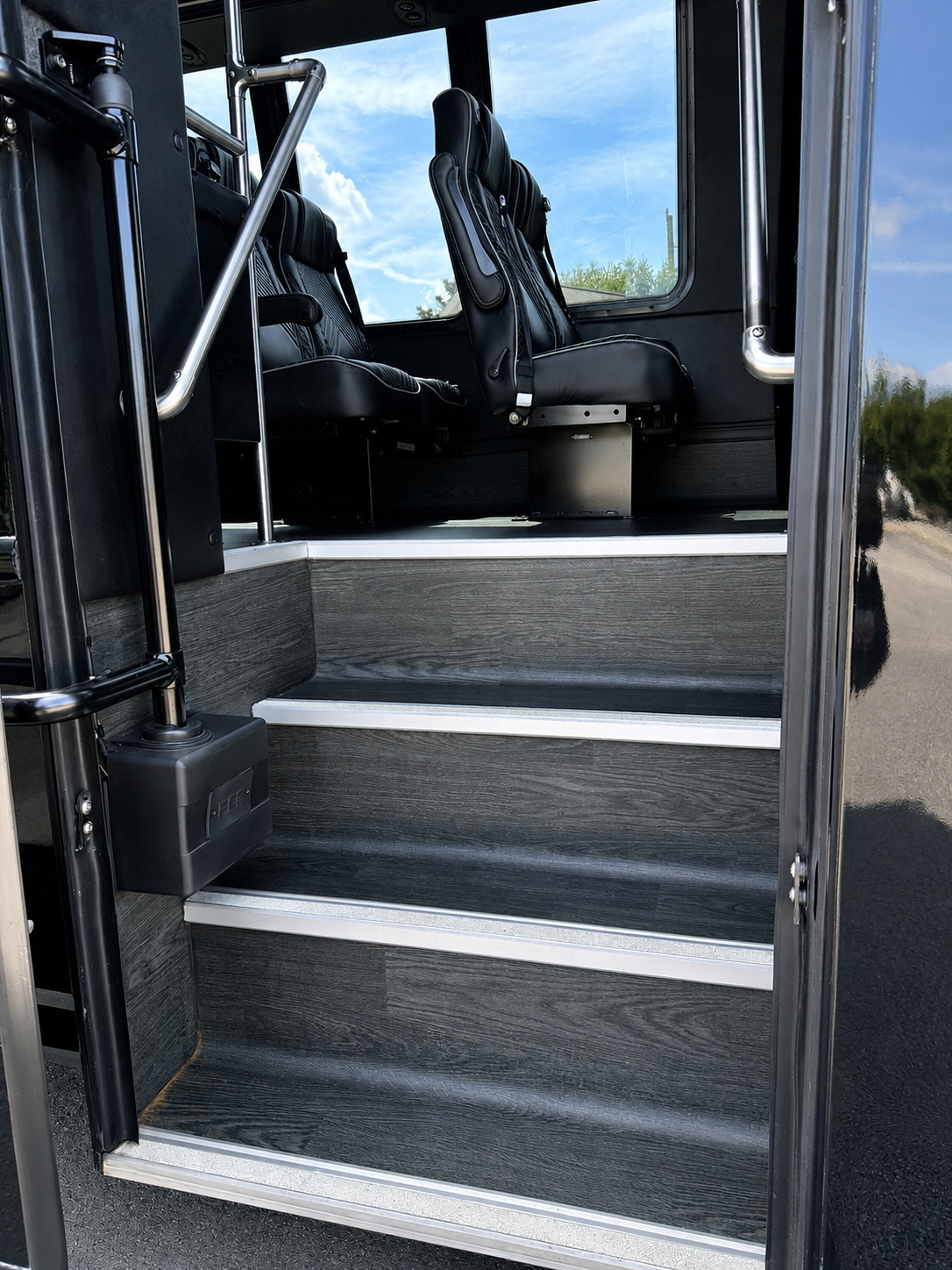 35 passenger minibus interior aisle and premium leather seating
