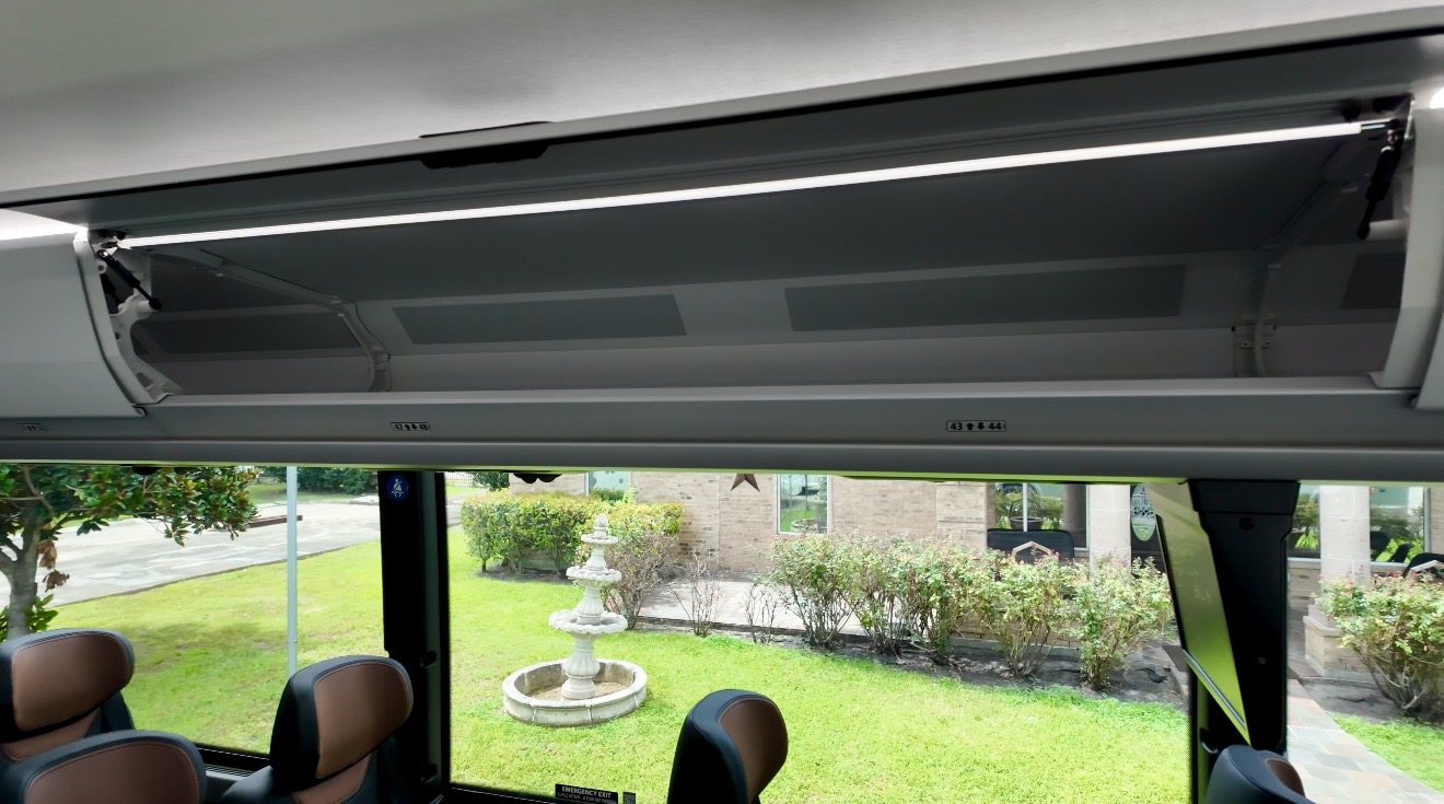 Overhead storage bins on Houston charter motor coach